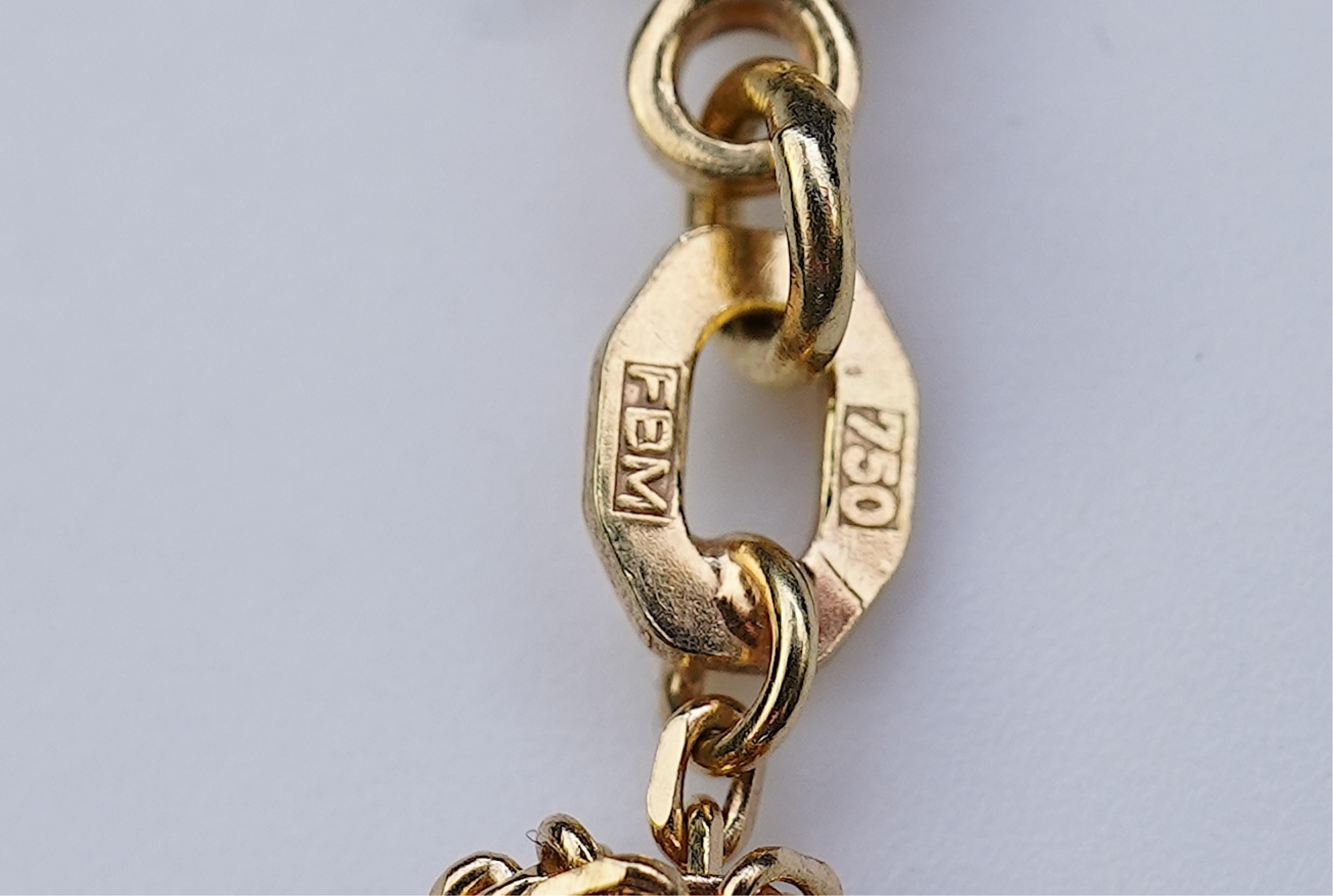 A sapphire and diamond pendant